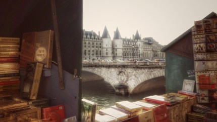 Le torri della Conciergerie spuntano tra due banchini dei bouquinistes